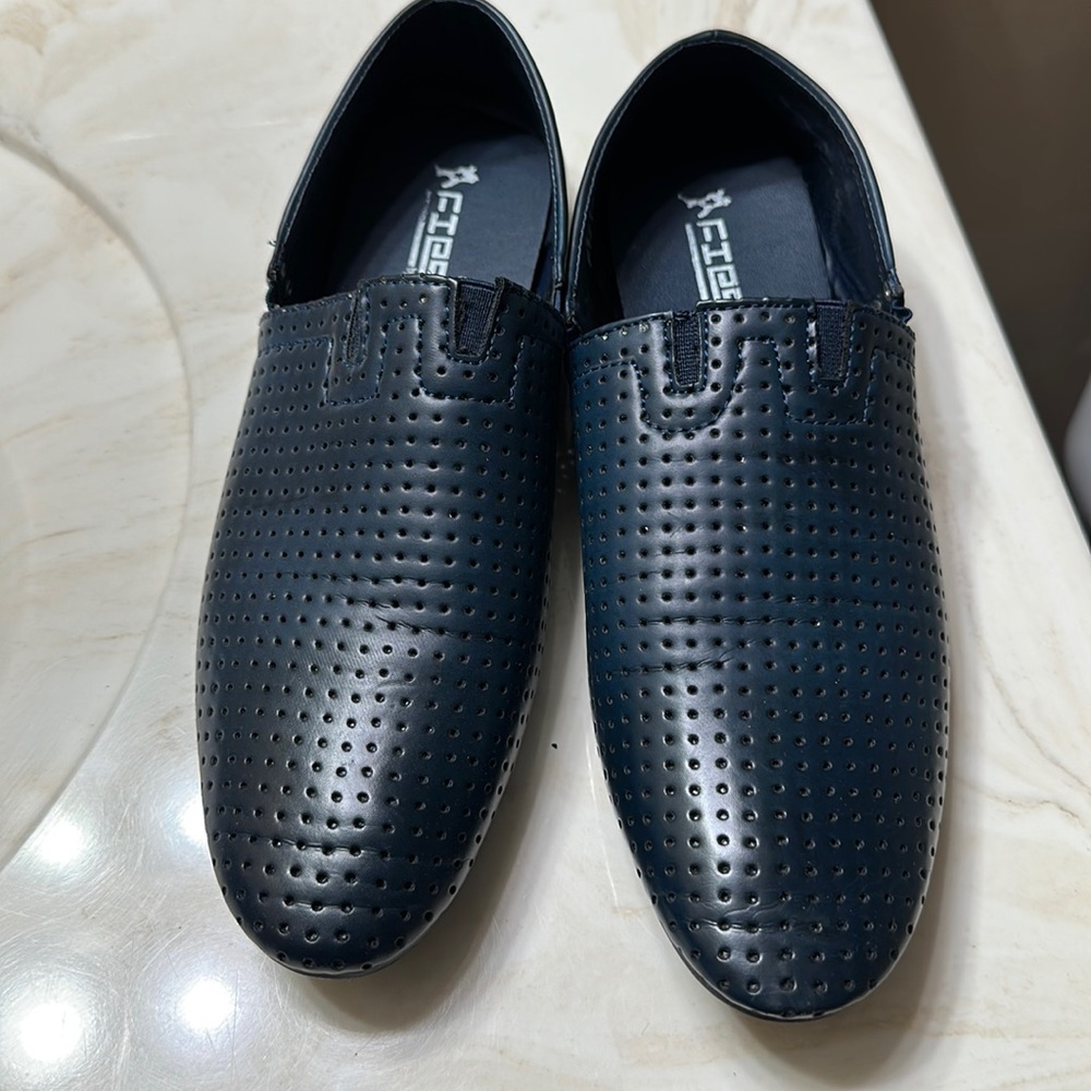 Flat loafers for easy walk about. I bought this pair but they didn’t fit.